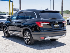 Used 2019  Honda Pilot 4d SUV FWD Touring 8-Passenger at A Motors Sales & Finance near San Antonio&comma; TX
