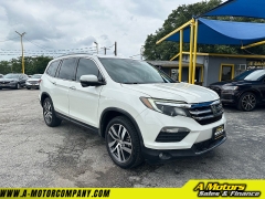 Used 2017 Honda Pilot 4d SUV AWD Touring at A Motors Sales & Finance near San Antonio, TX