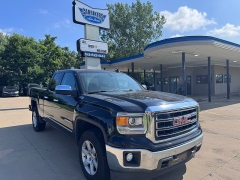 Used 2015 GMC Sierra 1500 4WD Double Cab SLT at Carrikers Auto Outlet near Oskaloosa, IA