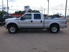 Used 2012 Ford Super Duty F-250 4WD Crew Cab XLT at Carrikers Auto Outlet near Oskaloosa, IA