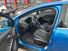 Used 2014  Ford Focus 4d Sedan Titanium at Carrikers Auto Outlet near Oskaloosa&comma; IA