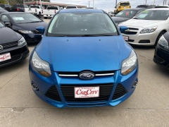  2014 Ford Focus 4d Sedan Titanium at Carrikers Auto Outlet near Oskaloosa&comma; IA