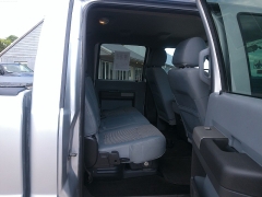 Used 2012 Ford Super Duty F-250 4WD Crew Cab XLT at Carrikers Auto Outlet near Oskaloosa, IA