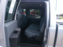 Used 2012 Ford Super Duty F-250 4WD Crew Cab XLT at Carrikers Auto Outlet near Oskaloosa, IA