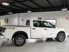Used 2015  Nissan Titan 4WD Crew Cab PRO-4X at Carrikers Auto Outlet near Oskaloosa&comma; IA