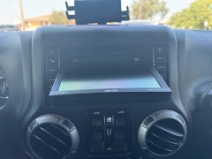 Used 2018  Jeep Wrangler JK Unlimited 4d SUV 4WD Sport S at Carrikers Auto Outlet near Oskaloosa&comma; IA