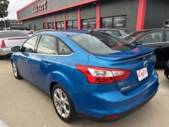 Used 2014  Ford Focus 4d Sedan Titanium at Carrikers Auto Outlet near Oskaloosa&comma; IA