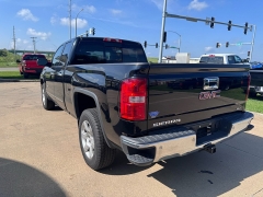 Used 2015 GMC Sierra 1500 4WD Double Cab SLT at Carrikers Auto Outlet near Oskaloosa, IA