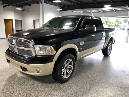 Used 2013 Ram 1500 4WD Crew Cab Laramie Longhorn at Carrikers Auto Outlet near Oskaloosa, IA