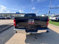Used 2015 GMC Sierra 1500 4WD Double Cab SLT at Carrikers Auto Outlet near Oskaloosa, IA