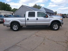 Used 2012 Ford Super Duty F-250 4WD Crew Cab XLT at Carrikers Auto Outlet near Oskaloosa, IA