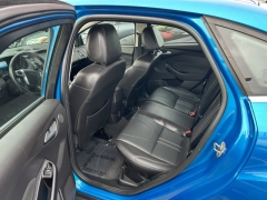 Used 2014  Ford Focus 4d Sedan Titanium at Carrikers Auto Outlet near Oskaloosa&comma; IA