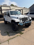 Used 2015  Jeep Wrangler Unlimited 4d Convertible Sahara Altitude at Carrikers Auto Outlet near Oskaloosa&comma; IA