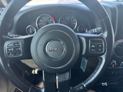Used 2018  Jeep Wrangler JK Unlimited 4d SUV 4WD Sport S at Carrikers Auto Outlet near Oskaloosa&comma; IA