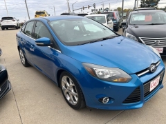Used 2014  Ford Focus 4d Sedan Titanium at Carrikers Auto Outlet near Oskaloosa&comma; IA