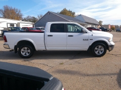 Used 2018 Ram 1500 4WD Crew Cab SLT Longbed at Carrikers Auto Outlet near Oskaloosa, IA