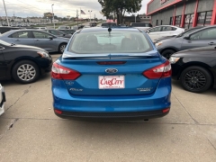 Used 2014  Ford Focus 4d Sedan Titanium at Carrikers Auto Outlet near Oskaloosa&comma; IA
