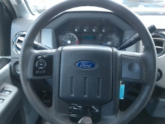Used 2012 Ford Super Duty F-250 4WD Crew Cab XLT at Carrikers Auto Outlet near Oskaloosa, IA