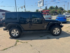 Used 2018  Jeep Wrangler JK Unlimited 4d SUV 4WD Sport S at Carrikers Auto Outlet near Oskaloosa&comma; IA