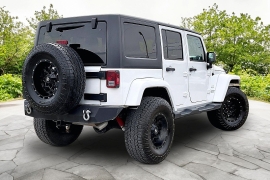 Used 2017  Jeep Wrangler Unlimited 4d Convertible Sahara at Carrikers Auto Outlet near Oskaloosa&comma; IA