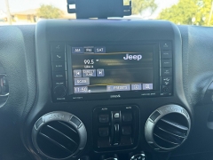 Used 2018  Jeep Wrangler JK Unlimited 4d SUV 4WD Sport S at Carrikers Auto Outlet near Oskaloosa&comma; IA