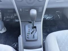 Used 2009  Toyota Corolla 4d Sedan LE at Carrikers Auto Outlet near Oskaloosa&comma; IA