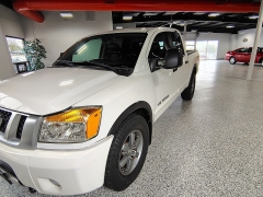 Used 2015  Nissan Titan 4WD Crew Cab PRO-4X at Carrikers Auto Outlet near Oskaloosa&comma; IA
