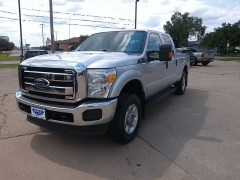 Used 2012 Ford Super Duty F-250 4WD Crew Cab XLT at Carrikers Auto Outlet near Oskaloosa, IA