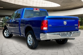 Used 2018 Ram 1500 4WD Quad Cab SLT at Pre-Owned Plus near San Antonio, TX