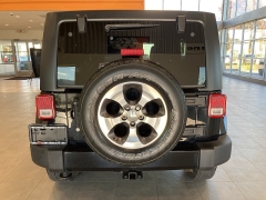 Used 2016  Jeep Wrangler Unlimited 4WD 4dr Sahara at Maxx Loans near St. Adrian, MI