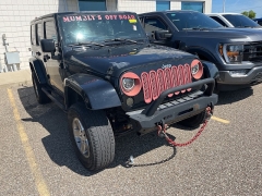 Used 2009 Jeep Wrangler Unlimited 4d Convertible 4WD Sahara at Suburban Ford of Sterling Heights near Sterling Heights, MI