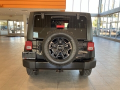 Used 2017  Jeep Wrangler Unlimited Willys Wheeler 4x4 at Maxx Loans near St. Adrian, MI