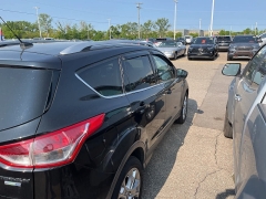 Used 2014 Ford Escape 4d SUV 4WD Titanium at Suburban Ford of Sterling Heights near Sterling Heights, MI