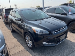 Used 2014 Ford Escape 4d SUV 4WD Titanium at Suburban Ford of Sterling Heights near Sterling Heights, MI