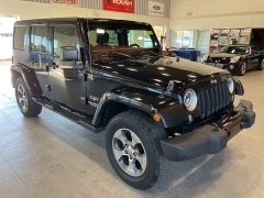Used 2016  Jeep Wrangler Unlimited 4WD 4dr Sahara at Maxx Loans near St. Adrian, MI