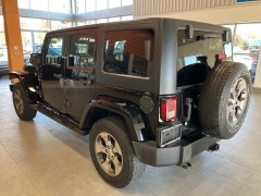 Used 2016  Jeep Wrangler Unlimited 4WD 4dr Sahara at Maxx Loans near St. Adrian, MI