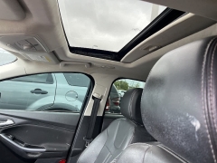 Used 2014 Ford Focus 4d Hatchback Titanium at Suburban Ford of Sterling Heights near Sterling Heights, MI