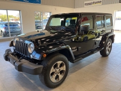 Used 2016  Jeep Wrangler Unlimited 4WD 4dr Sahara at Maxx Loans near St. Adrian, MI