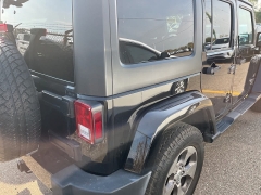Used 2016 Jeep Wrangler Unlimited 4WD 4dr Sahara at Suburban Ford of Sterling Heights near Sterling Heights, MI