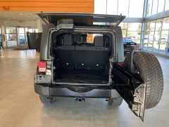 Used 2016  Jeep Wrangler Unlimited 4WD 4dr Sahara at Maxx Loans near St. Adrian, MI