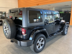 Used 2016  Jeep Wrangler Unlimited 4WD 4dr Sahara at Maxx Loans near St. Adrian, MI