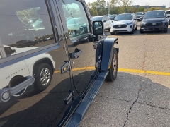 Used 2016 Jeep Wrangler Unlimited 4WD 4dr Sahara at Suburban Ford of Sterling Heights near Sterling Heights, MI