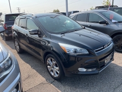 Used 2014 Ford Escape 4d SUV 4WD Titanium at Suburban Ford of Sterling Heights near Sterling Heights, MI