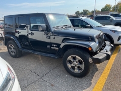 Used 2016 Jeep Wrangler Unlimited 4WD 4dr Sahara at Suburban Ford of Sterling Heights near Sterling Heights, MI
