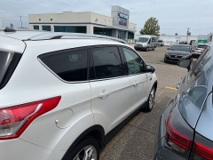Used 2014 Ford Escape 4d SUV FWD Titanium at Suburban Ford of Sterling Heights near Sterling Heights, MI