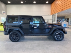 Used 2017  Jeep Wrangler Unlimited Willys Wheeler 4x4 at Maxx Loans near St. Adrian, MI