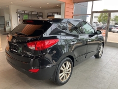 Used 2013 Hyundai Tucson FWD 4dr Auto Limited at Suburban Ford of Sterling Heights near Sterling Heights, MI