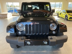 Used 2016  Jeep Wrangler Unlimited 4WD 4dr Sahara at Maxx Loans near St. Adrian, MI