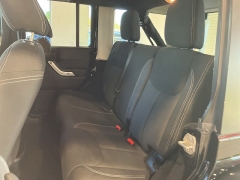 Used 2016  Jeep Wrangler Unlimited 4WD 4dr Sahara at Maxx Loans near St. Adrian, MI