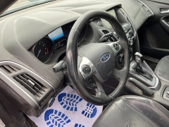 Used 2014 Ford Focus 4d Hatchback Titanium at Suburban Ford of Sterling Heights near Sterling Heights, MI